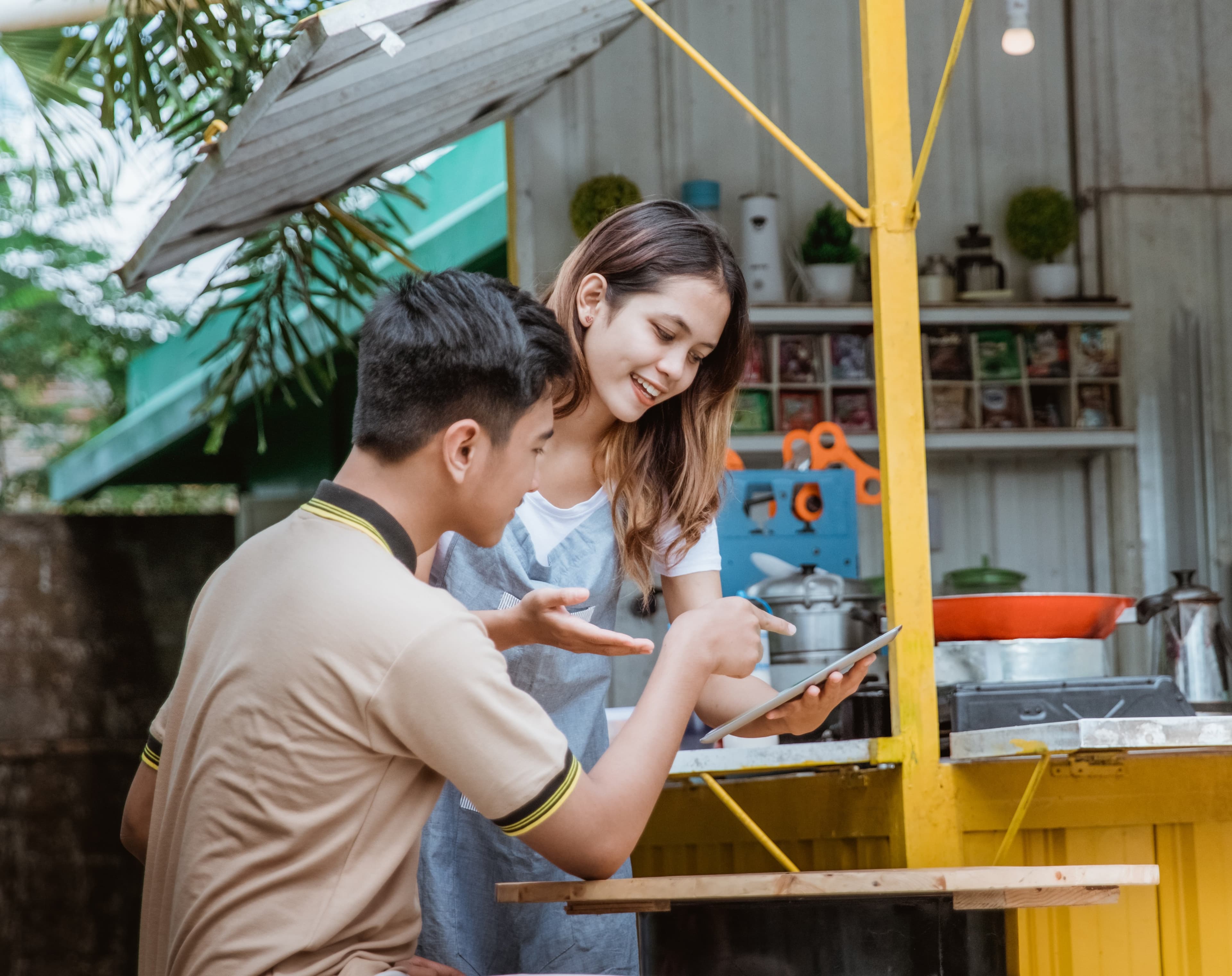 Family ordering food at restaurant